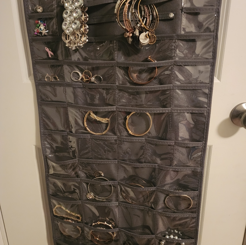 Jewelry lot with hanging jewelry organizer